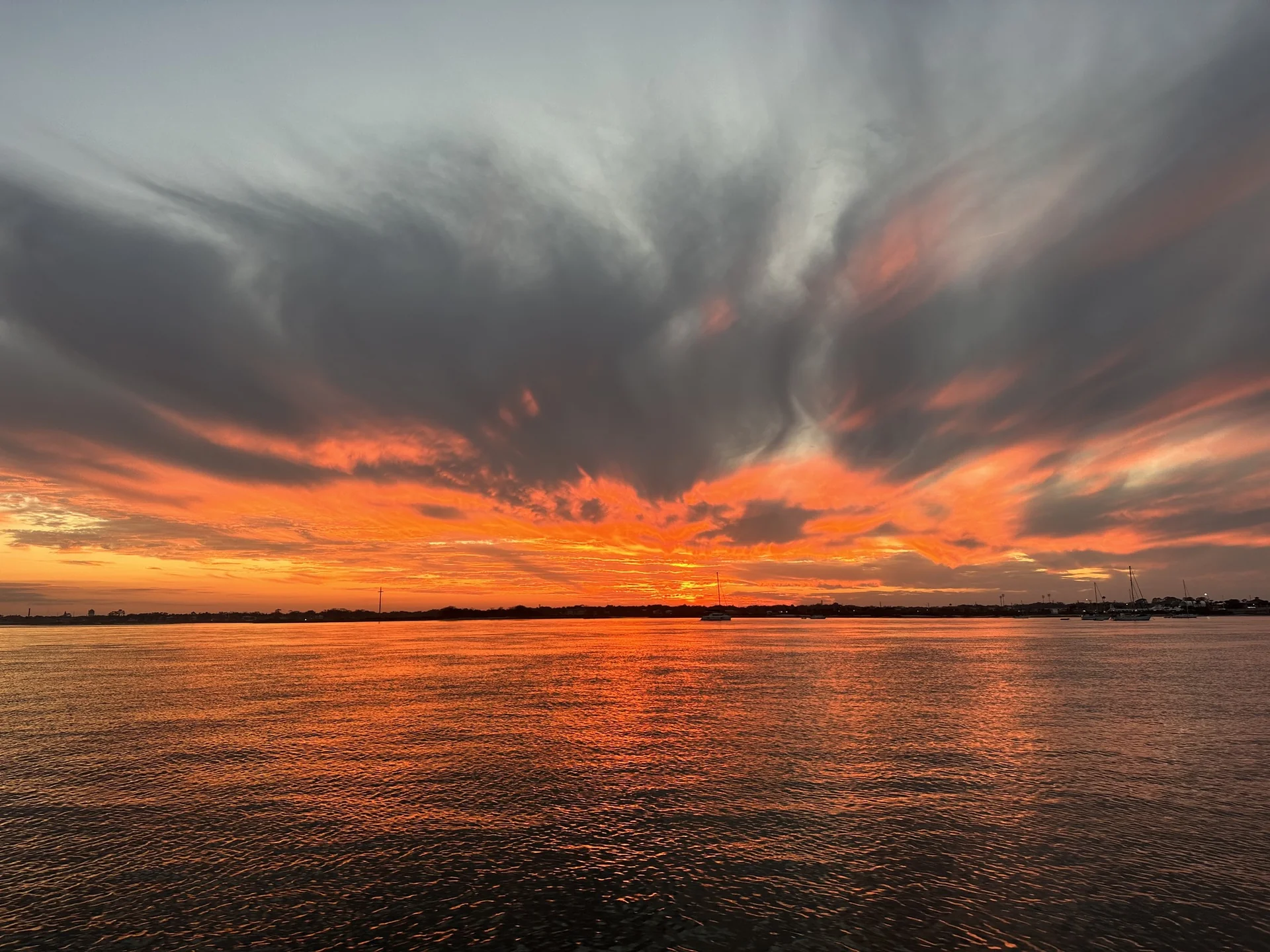 Dramatic orange sunset over the St. Augustine waterway
